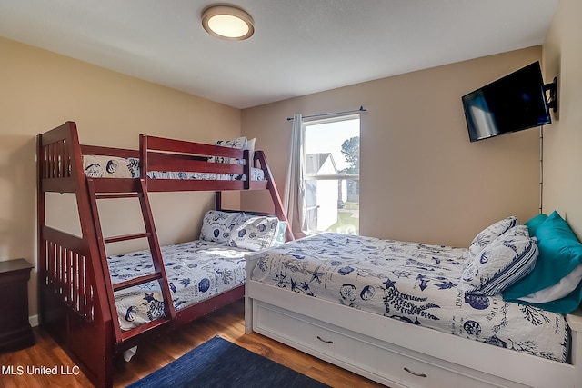 bedroom featuring dark hardwood / wood-style floors