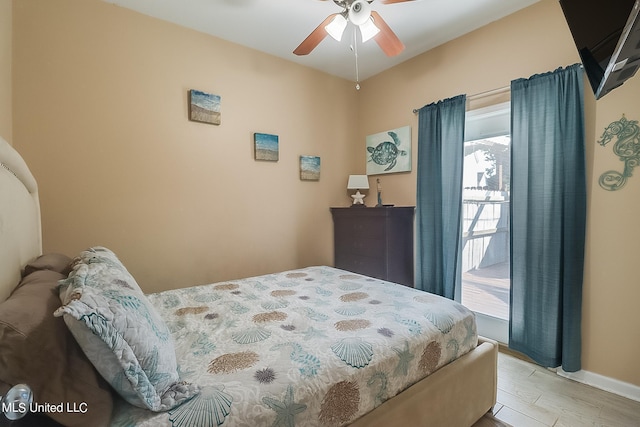 bedroom with light hardwood / wood-style floors and ceiling fan