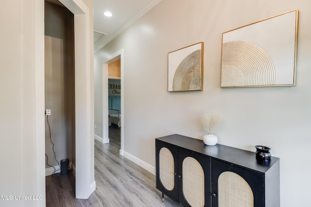 737 Ieke Cir, Diamondhead, MS 39525 - hall featuring baseboards, wood finished floors, crown molding, and recessed lighting