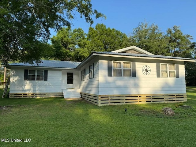 13120 Ridgeland Rd, Vancleave, MS 39565 - view of front of property with a front lawn and a metal roof