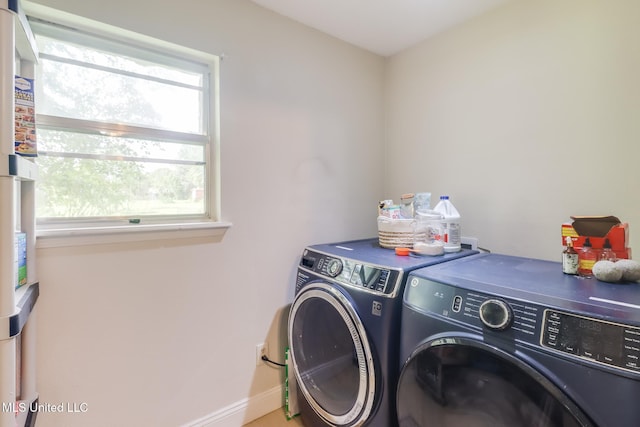 13120 Ridgeland Rd, Vancleave, MS 39565 - laundry room with washing machine and dryer and baseboards