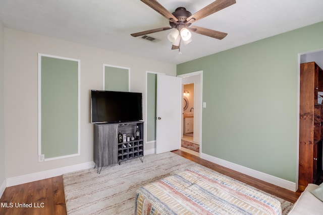 13120 Ridgeland Rd, Vancleave, MS 39565 - bedroom featuring wood finished floors and a ceiling fan