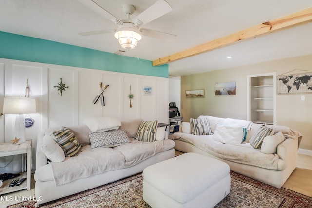 13120 Ridgeland Rd, Vancleave, MS 39565 - living room with ceiling fan, beamed ceiling, and wood finished floors