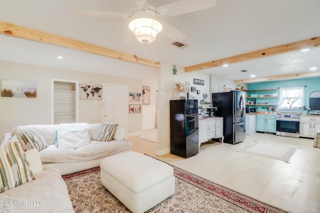 13120 Ridgeland Rd, Vancleave, MS 39565 - living area featuring beamed ceiling and recessed lighting