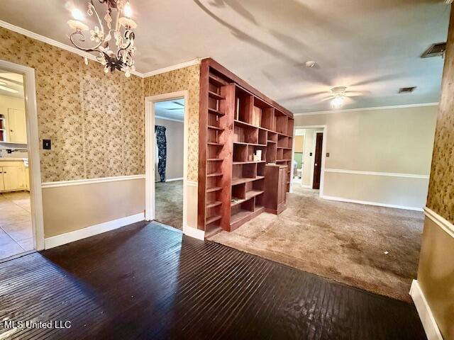 538 Will O Wisp Way, Jackson, MS 39204 - unfurnished room featuring hardwood / wood-style flooring, a chandelier, crown molding, a ceiling fan, and wallpapered walls