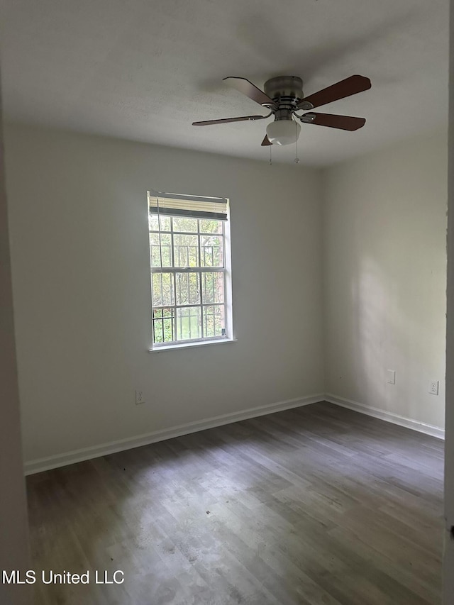 2806 Tara Rd, Jackson, MS 39212 - empty room featuring ceiling fan, wood finished floors, and baseboards