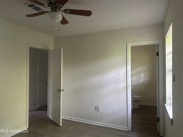 2806 Tara Rd, Jackson, MS 39212 - unfurnished bedroom featuring wood finished floors, baseboards, and a ceiling fan