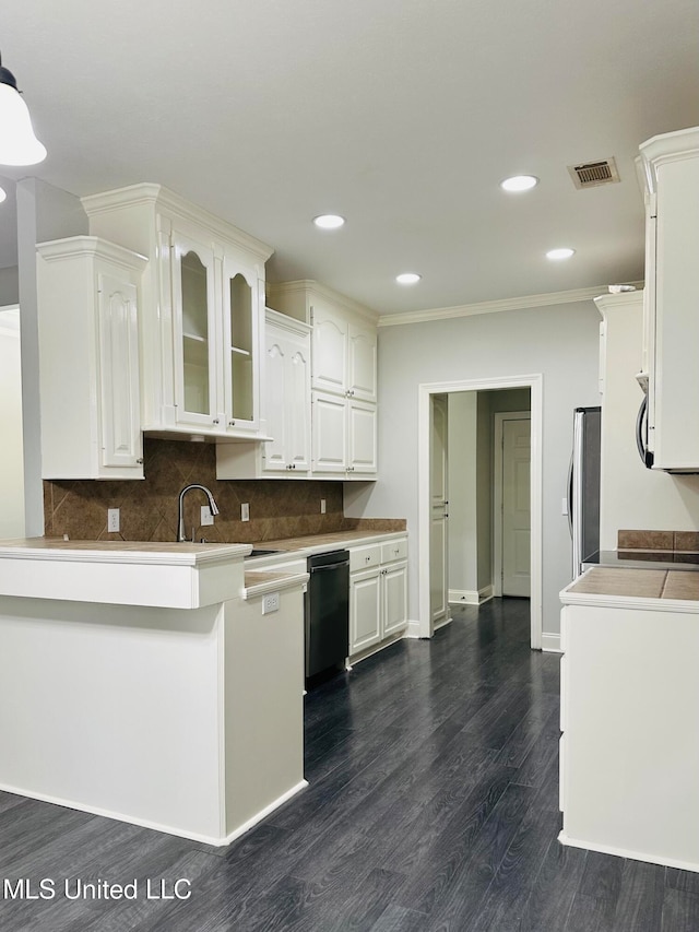 kitchen with black dishwasher, dark hardwood / wood-style floors, sink, white cabinets, and kitchen peninsula