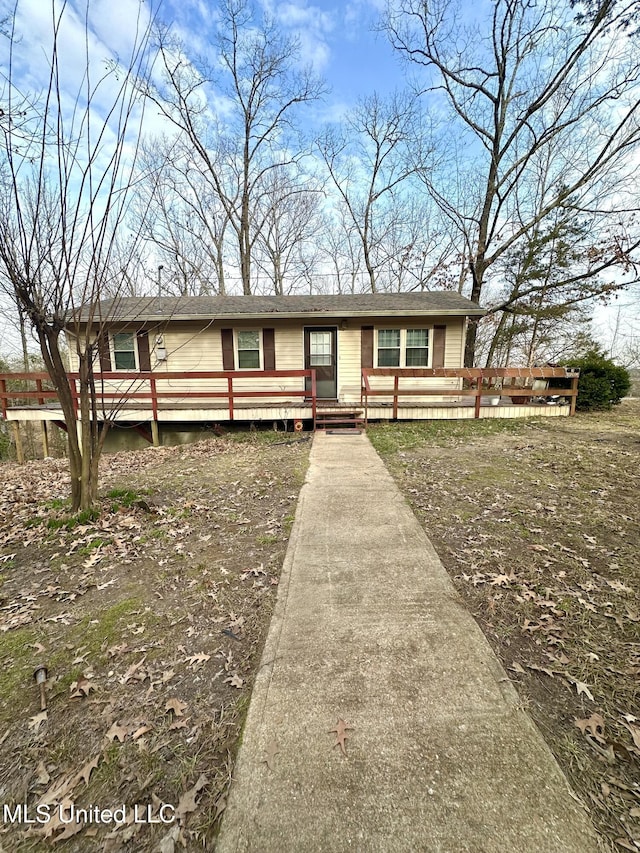 52 Dog Wood Cove Rd, Coffeeville, MS 38922 - view of front of house featuring a deck