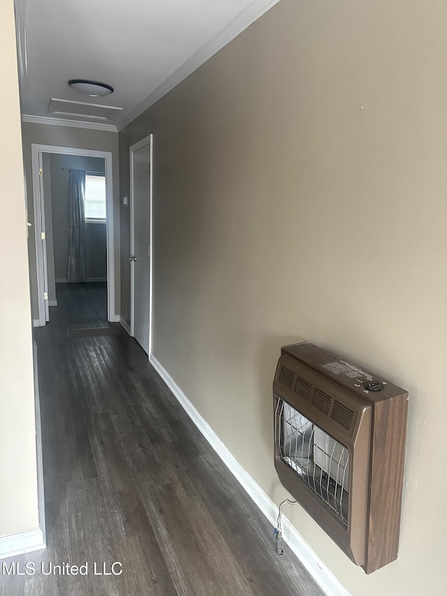 52 Dog Wood Cove Rd, Coffeeville, MS 38922 - hall featuring dark wood-style flooring, baseboards, crown molding, and heating unit