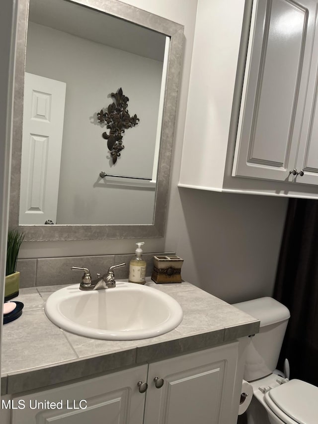 108 Brunswick Cv, Canton, MS 39046 - bathroom with vanity and toilet