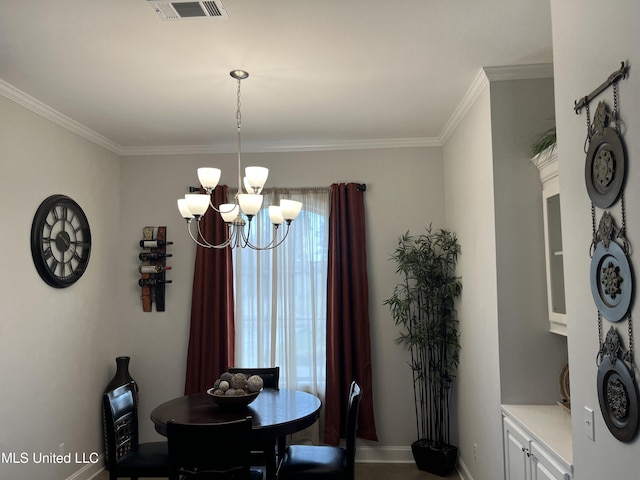 108 Brunswick Cv, Canton, MS 39046 - dining area featuring crown molding, a chandelier, and baseboards