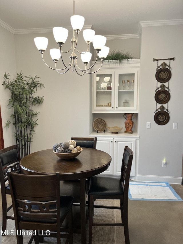 108 Brunswick Cv, Canton, MS 39046 - carpeted dining area with a chandelier, ornamental molding, and baseboards