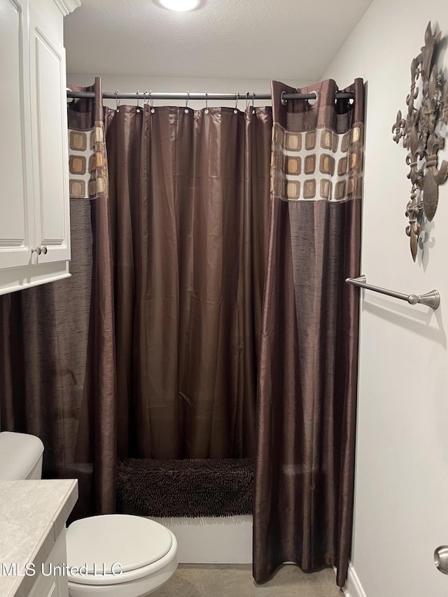 108 Brunswick Cv, Canton, MS 39046 - full bathroom featuring toilet, vanity, and a shower with curtain
