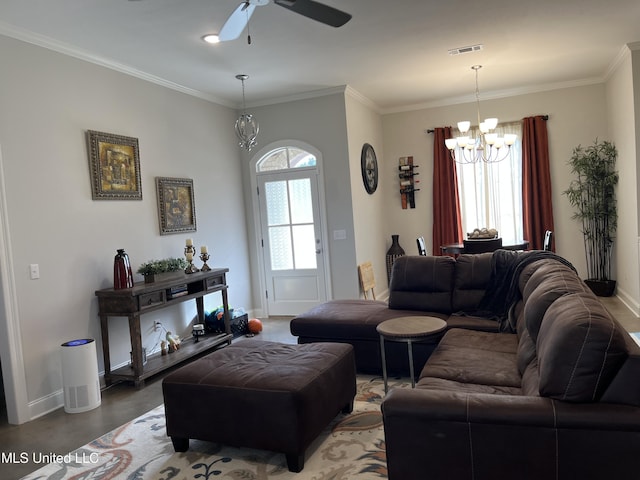 108 Brunswick Cv, Canton, MS 39046 - living area with a chandelier, baseboards, crown molding, a ceiling fan, and finished concrete flooring