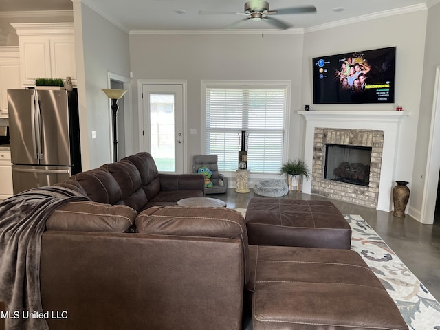 108 Brunswick Cv, Canton, MS 39046 - living area featuring a ceiling fan, ornamental molding, concrete flooring, and a brick fireplace