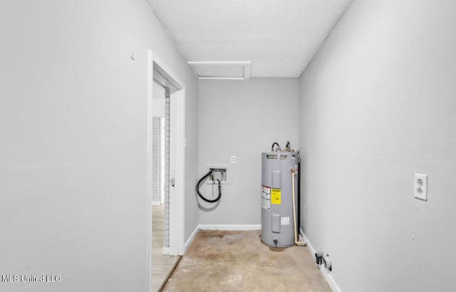 utility room featuring water heater