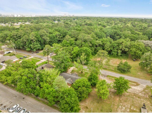 bird's eye view featuring a forest view