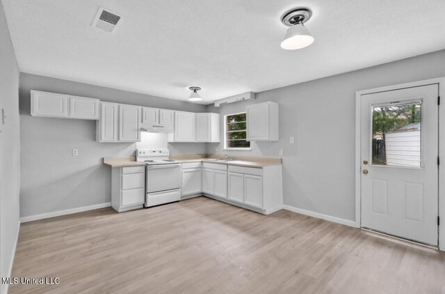 kitchen featuring visible vents, baseboards, under cabinet range hood, white electric range, and light wood finished floors