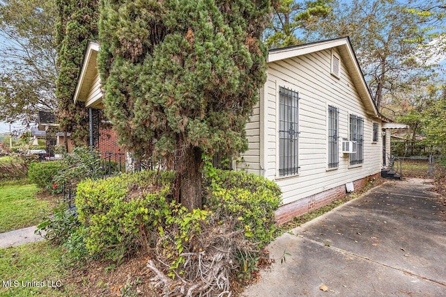 view of home's exterior featuring cooling unit