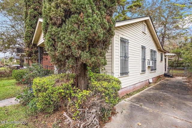 518 W Ash St, Jackson, MS 39203 - view of property exterior with cooling unit and crawl space