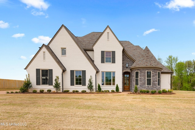 view of front of home with a front yard