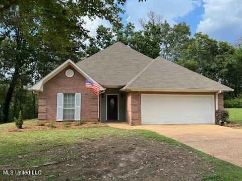 single story home featuring a garage