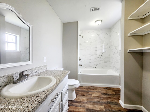 9108 Moser Ave, Vancleave, MS 39565 - full bath with toilet, vanity, wood finished floors, and shower / washtub combination