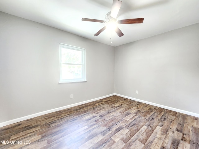 9108 Moser Ave, Vancleave, MS 39565 - spare room featuring wood finished floors, ceiling fan, and baseboards