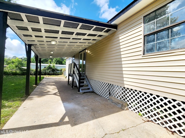 9108 Moser Ave, Vancleave, MS 39565 - view of patio / terrace featuring entry steps and a carport