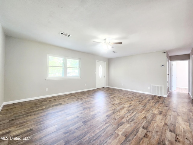 9108 Moser Ave, Vancleave, MS 39565 - empty room with a ceiling fan, wood finished floors, and baseboards