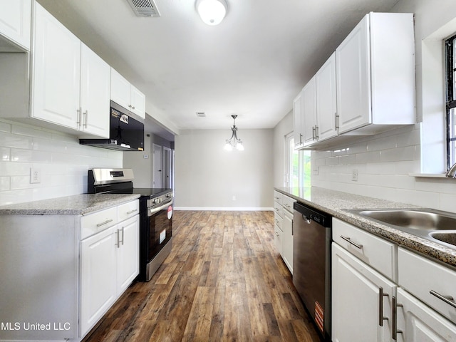 9108 Moser Ave, Vancleave, MS 39565 - kitchen with stainless steel appliances, dark wood-style flooring, tasteful backsplash, white cabinets, and baseboards