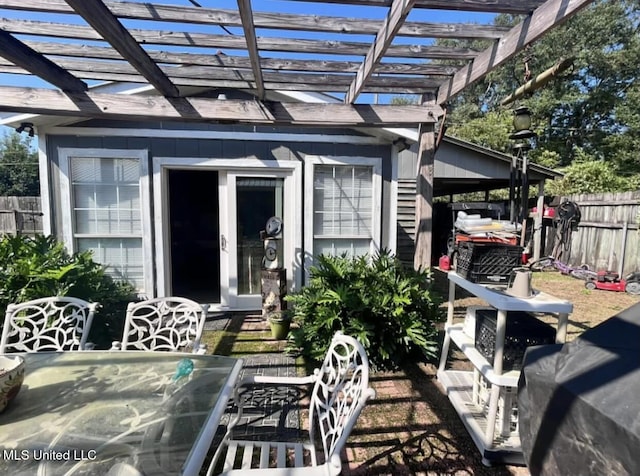 view of patio featuring a pergola