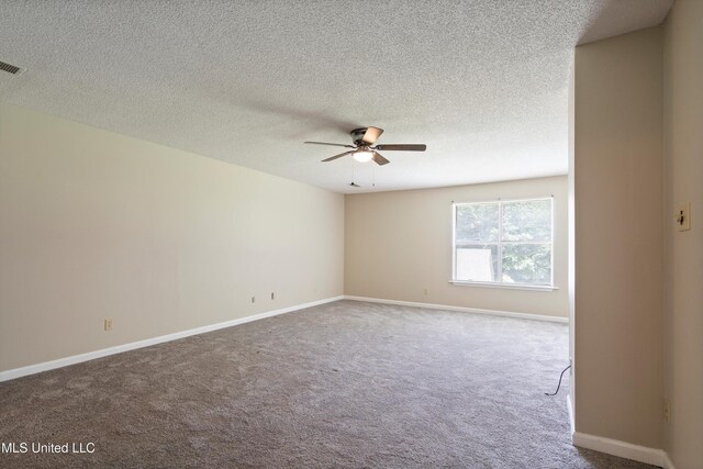 3590 Shady Oaks Dr, Olive Branch, MS 38654 - carpeted empty room featuring a ceiling fan, baseboards, and a textured ceiling