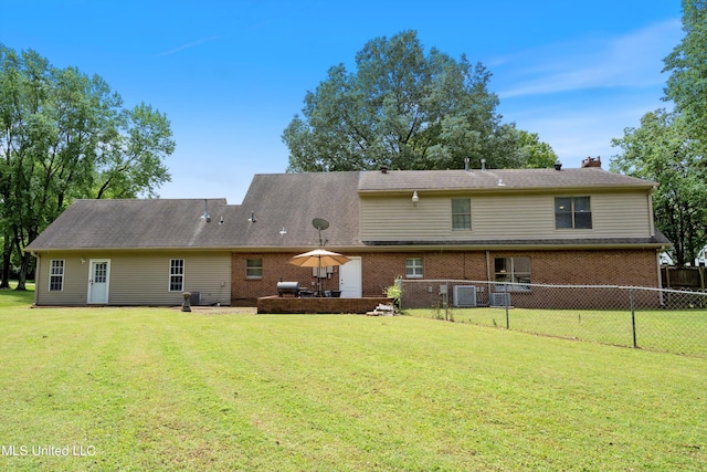 3590 Shady Oaks Dr, Olive Branch, MS 38654 - rear view of property featuring brick siding and a chimney