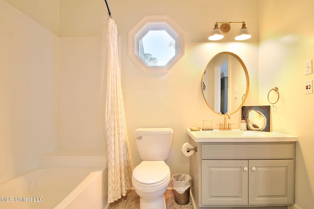 full bathroom with vanity, hardwood / wood-style flooring, toilet, and shower / tub combo with curtain