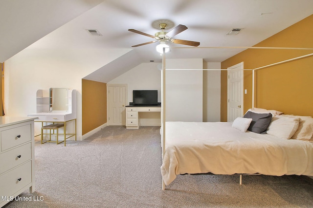 carpeted bedroom with ceiling fan and lofted ceiling