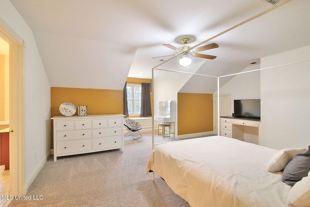 carpeted bedroom featuring ceiling fan and lofted ceiling