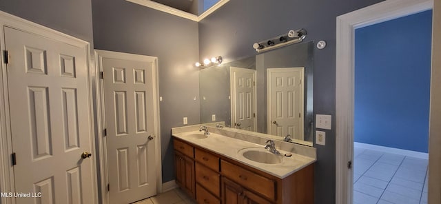 bathroom with vanity and tile patterned floors