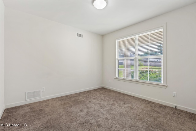 4406 John Wood Ln, Olive Branch, MS 38654 - spare room featuring carpet floors and baseboards