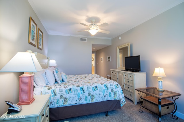 carpeted bedroom with visible vents, a ceiling fan, and crown molding