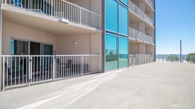 view of building exterior featuring a water view