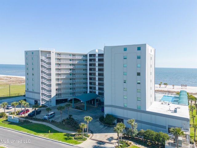 view of building exterior featuring a water view