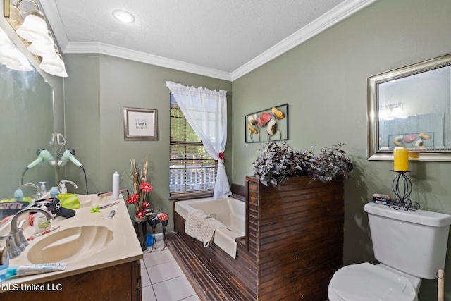 bathroom with vanity, toilet, tile patterned floors, and a textured ceiling