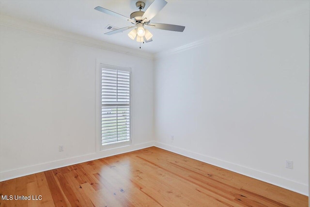 unfurnished room with crown molding, wood-type flooring, and ceiling fan