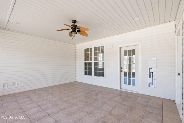 view of patio featuring ceiling fan