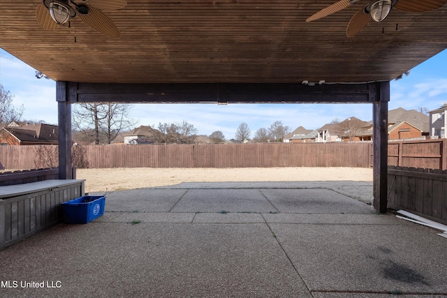 view of patio featuring ceiling fan