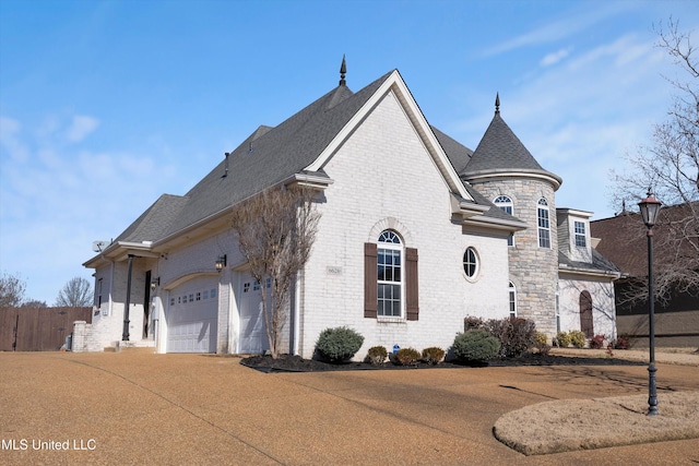 view of home's exterior with a garage