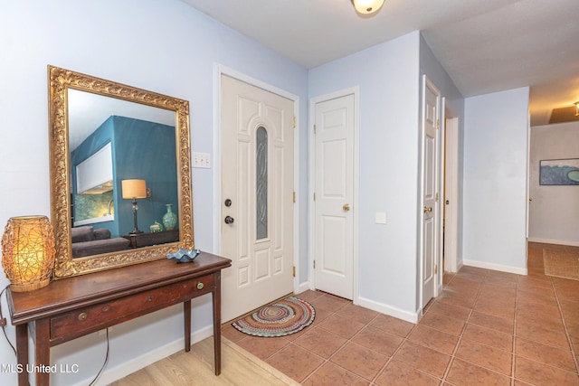 entrance foyer featuring light tile patterned floors