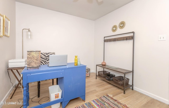 office space with ceiling fan and hardwood / wood-style floors